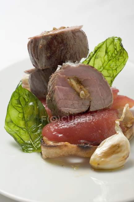 Pork fillet with tomatoes — Stock Photo