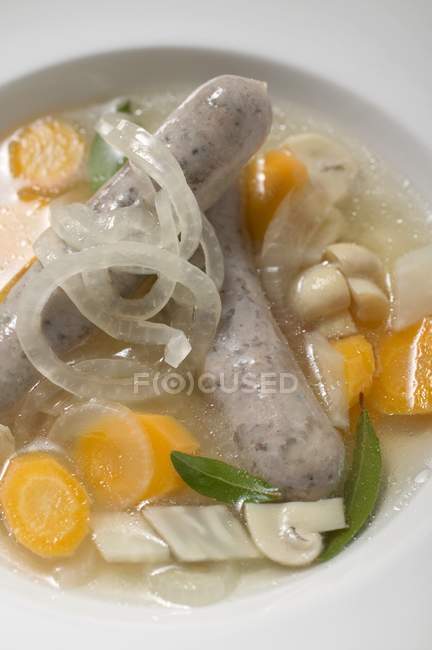 Vegetable soup with sausages — Stock Photo