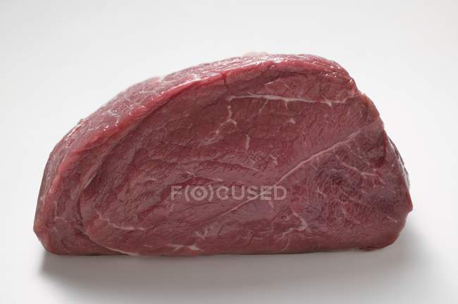 Piece of raw beef from rump — Stock Photo