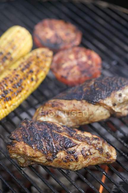 Chicken breast and corn — Stock Photo
