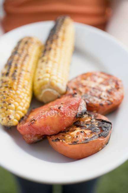 Plate of grilled corn — Stock Photo