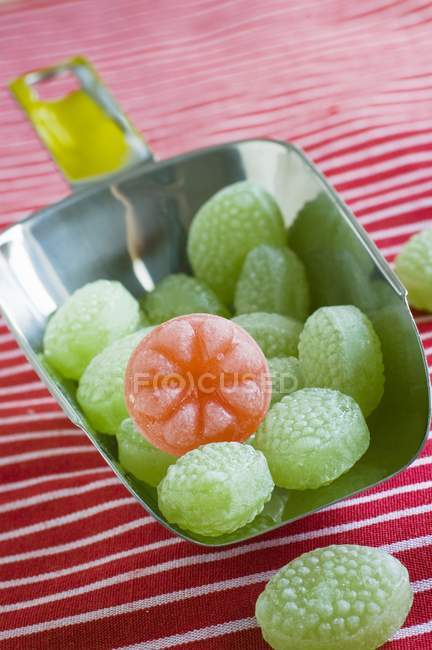 Зелений солодощі в совок — стокове фото