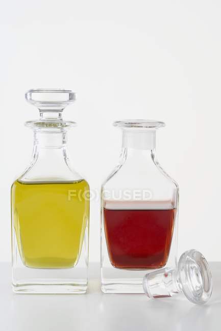 Olive oil and vinegar in bottles — Stock Photo