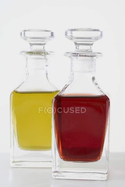 Olive oil and vinegar in bottles — Stock Photo