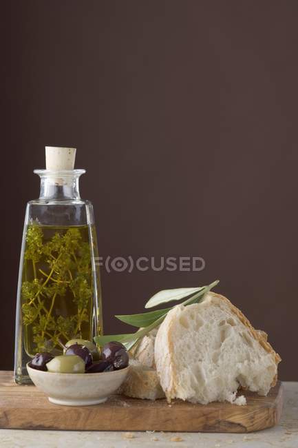 Thyme oil in bottle — Stock Photo