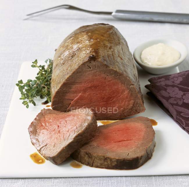 Roasted Beef fillet with herbs — Stock Photo
