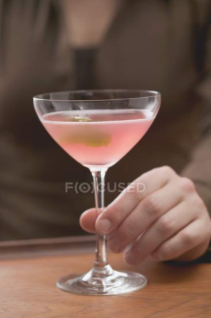 Pink Martini with olive — Stock Photo