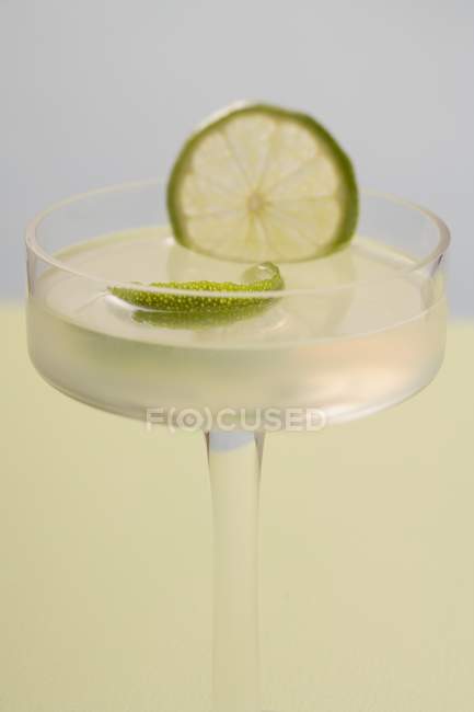 Caipirinha with lime in elegant glass — Stock Photo