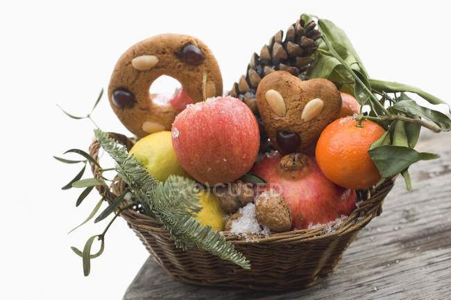 Uts and cones in basket — Stock Photo