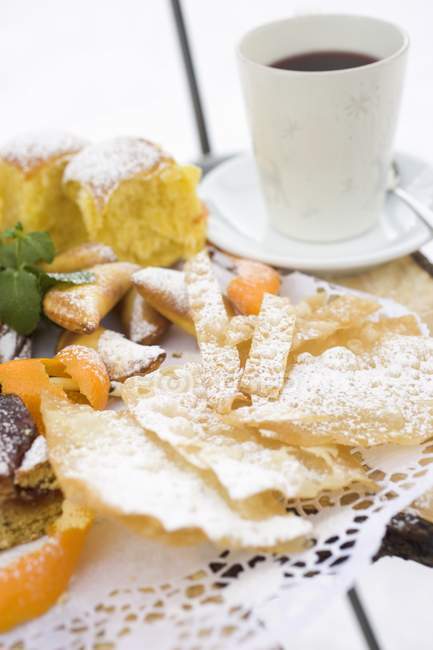 Fried pastries with icing sugar — Stock Photo