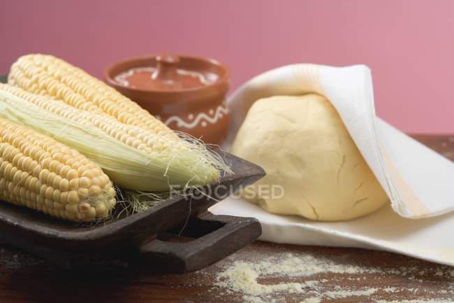Ortilla dough and corn — Stock Photo