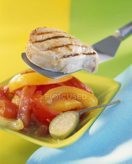 Grilled swordfish with peppers — Stock Photo