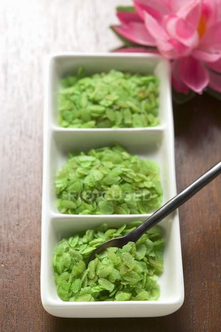 Copos de arroz verde - foto de stock