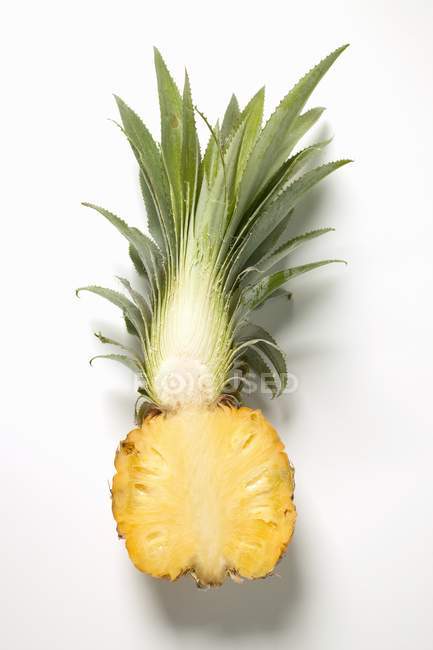 Half ripe pineapple — Stock Photo