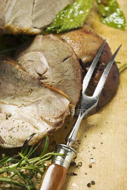Sliced Roasted leg of lamb — Stock Photo