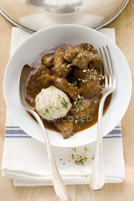 Beef goulash with bread — Stock Photo