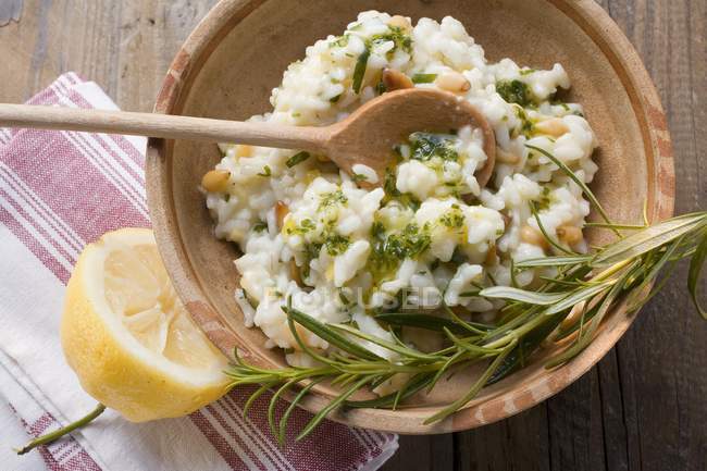 Lemon risotto with pine nuts — Stock Photo