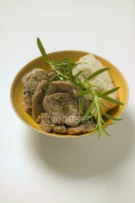 Pork fillet with rosemary — Stock Photo