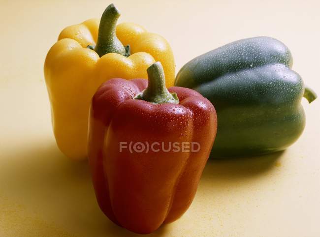 Peppers with drops of water — Stock Photo