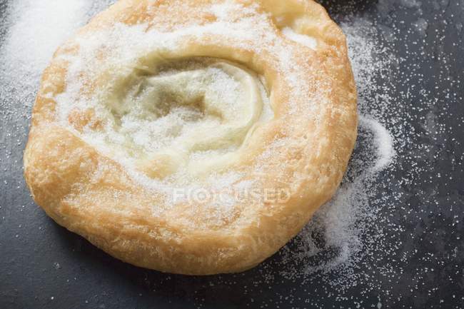 Closeup view of Auszogene Bavarian fried pastry with sugar — Stock Photo