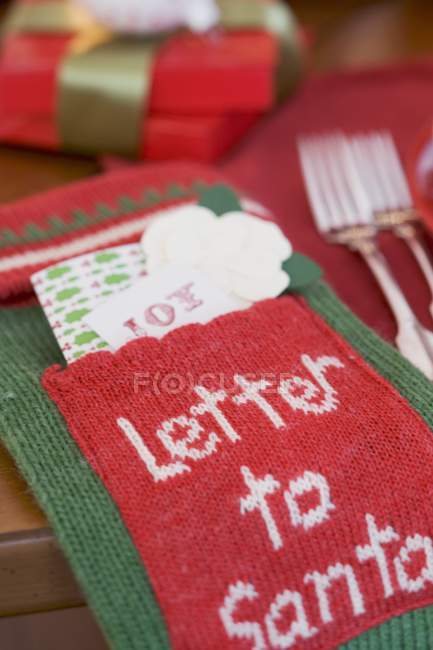 Christmas decorations on setting table — Stock Photo