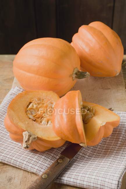 Fresh ripe squashes with slices — Stock Photo