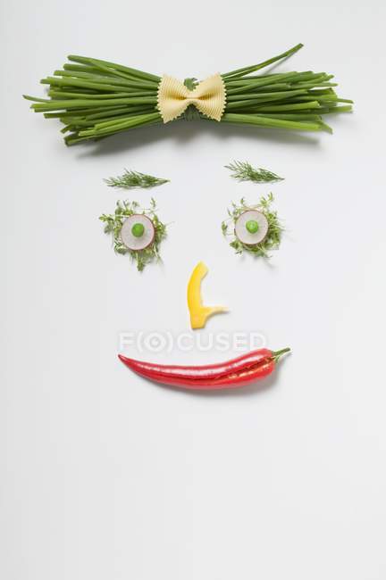 Жіноче обличчя з овочів — стокове фото