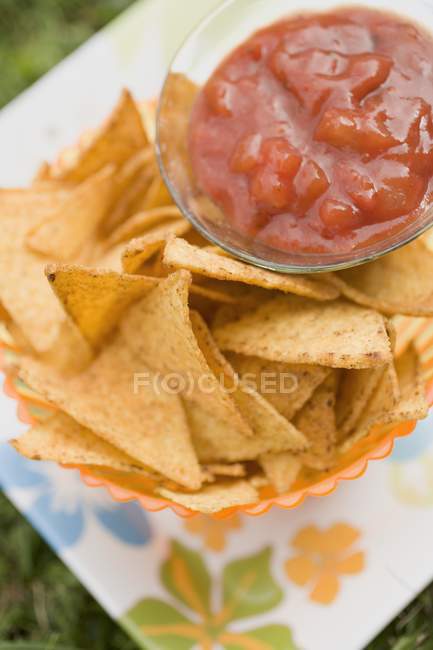 Nachos and tomato salsa — Stock Photo