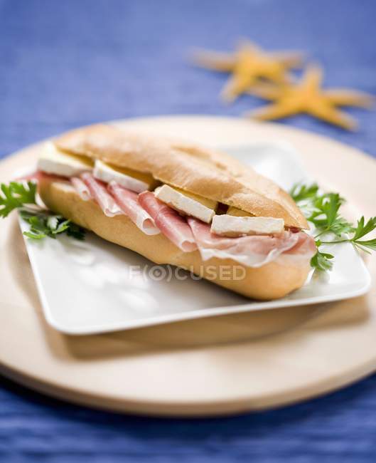 Brie and bacon roll — Stock Photo