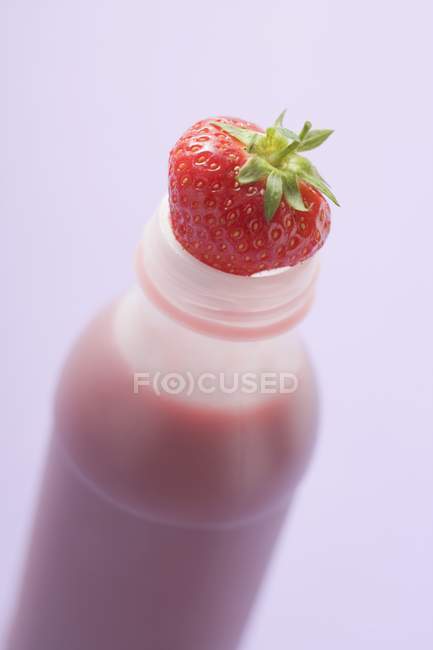 Strawberry drink in plastic bottle — Stock Photo