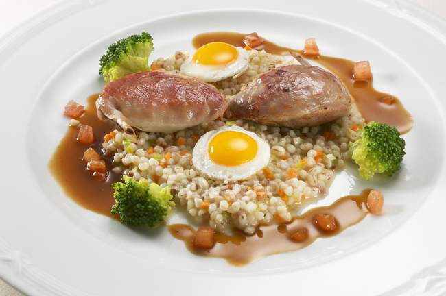 Quail breasts with eggs — Stock Photo