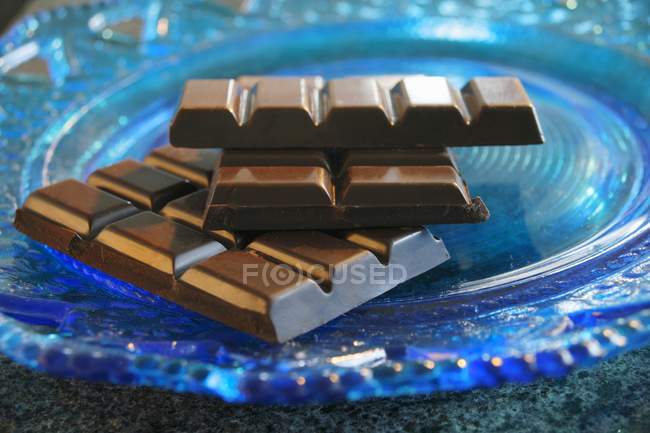 Broken bar of chocolate — Stock Photo