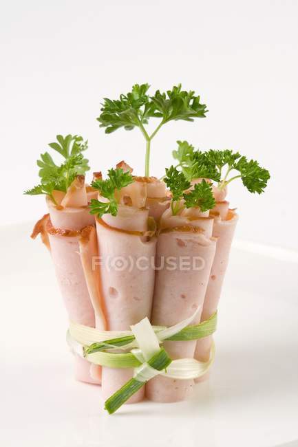 Bunch of Ham rolls with parsley — Stock Photo