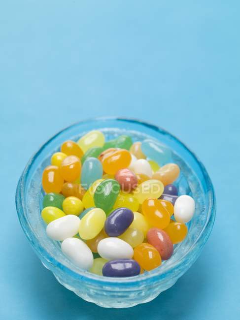 Jelly beans in blue dish — Stock Photo