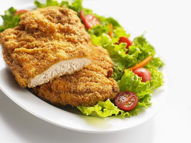 Breaded chicken breast — calories, vitality - Stock Photo | #150166238