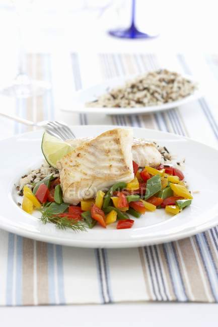 Haddock fillet with wild rice — Stock Photo