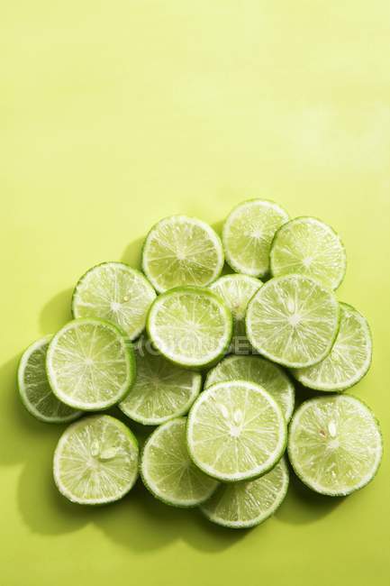 Fresh sliced limes — Stock Photo