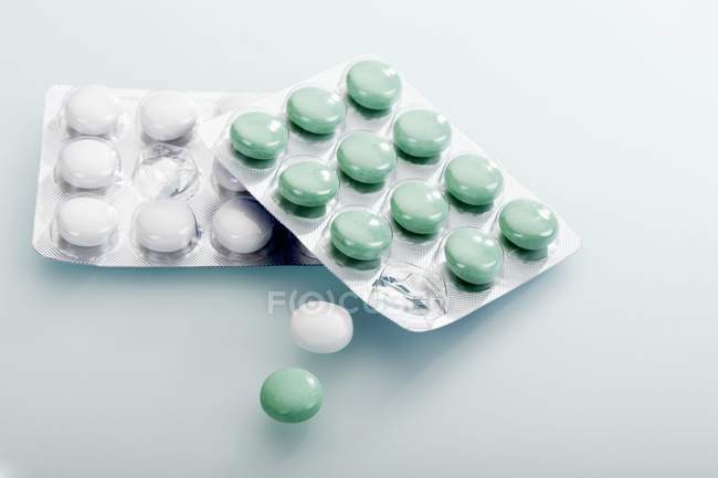 Closeup view of chewing gum pellets in blister packs — Stock Photo