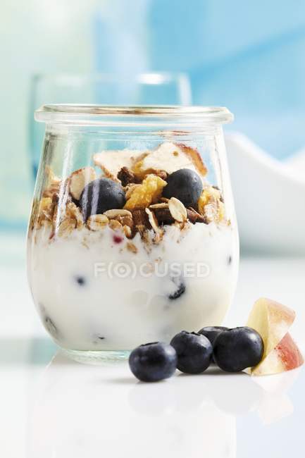 Yoghurt with muesli — Stock Photo