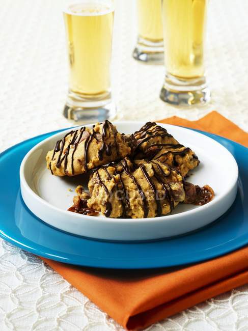 Caramel pumpkin cookies with chocolate drizzle — Stock Photo