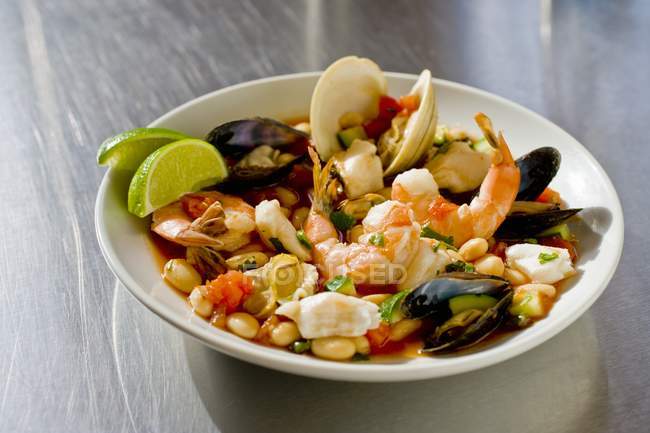 Closeup view of Mexican seafood stew in bowl — Stock Photo