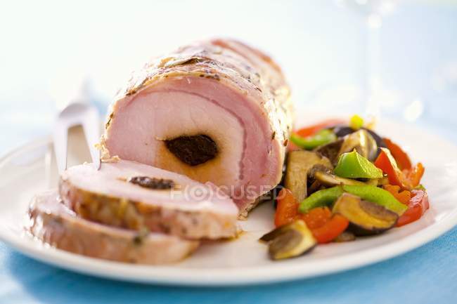 Ham stuffed with prunes — Stock Photo