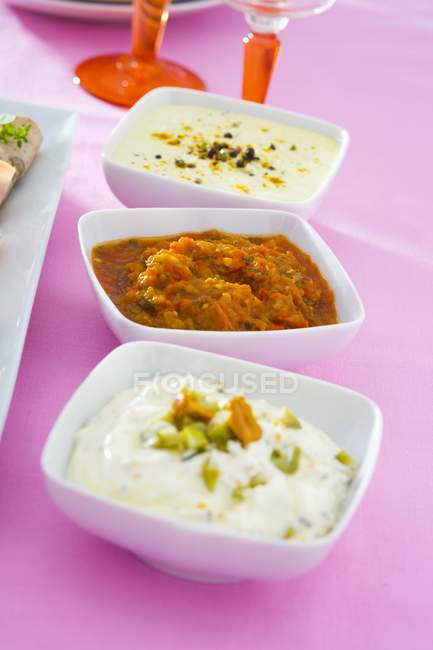 Yoghurt dip in dishes — Stock Photo