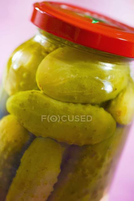 Pickled gherkins in jar — Stock Photo