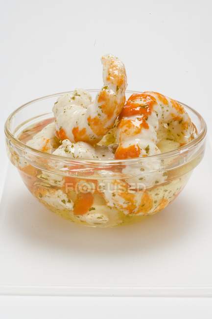 Cooked Surimi prawns in oil with herb — Stock Photo