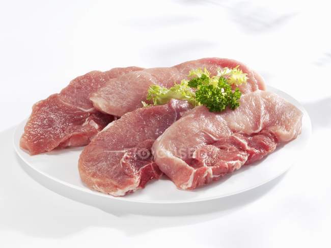 Pork leg steaks — Stock Photo