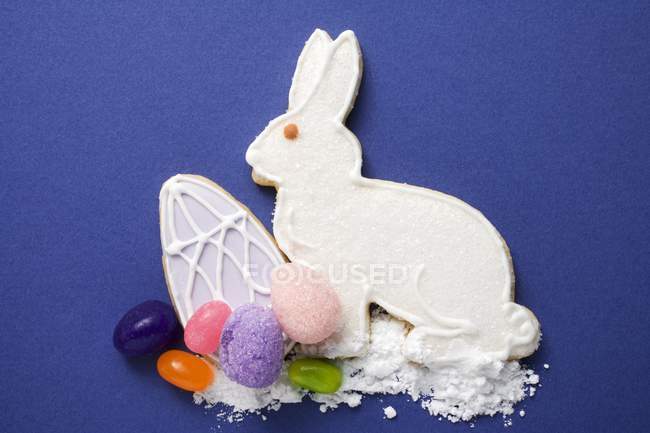 Easter biscuit over blue background — Stock Photo
