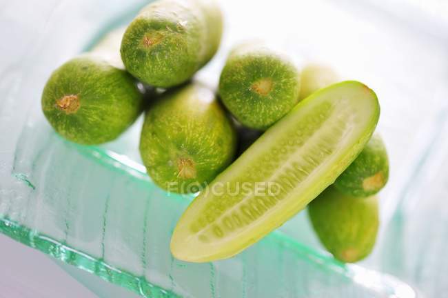 Thai cucumbers whole and halved — Stock Photo