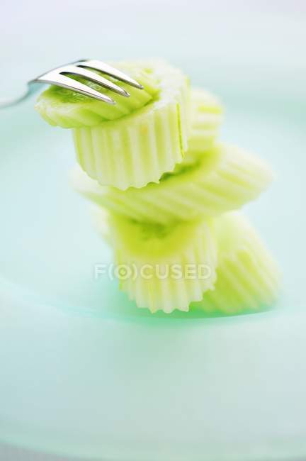 Peeled and sliced Thai cucumber — Stock Photo