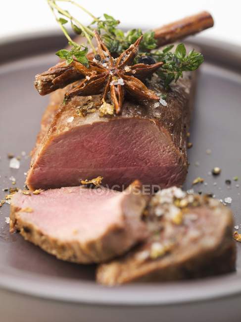 Loin of venison with herbs — Stock Photo